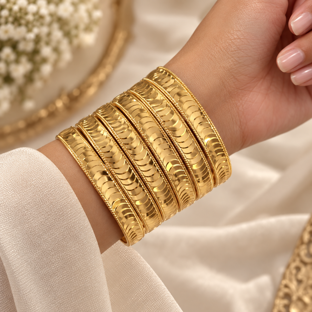 Gold tone textured bangle bracelet set