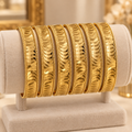 Gold tone textured bangle bracelet set